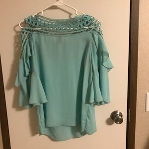 Women’s turquoise blouse